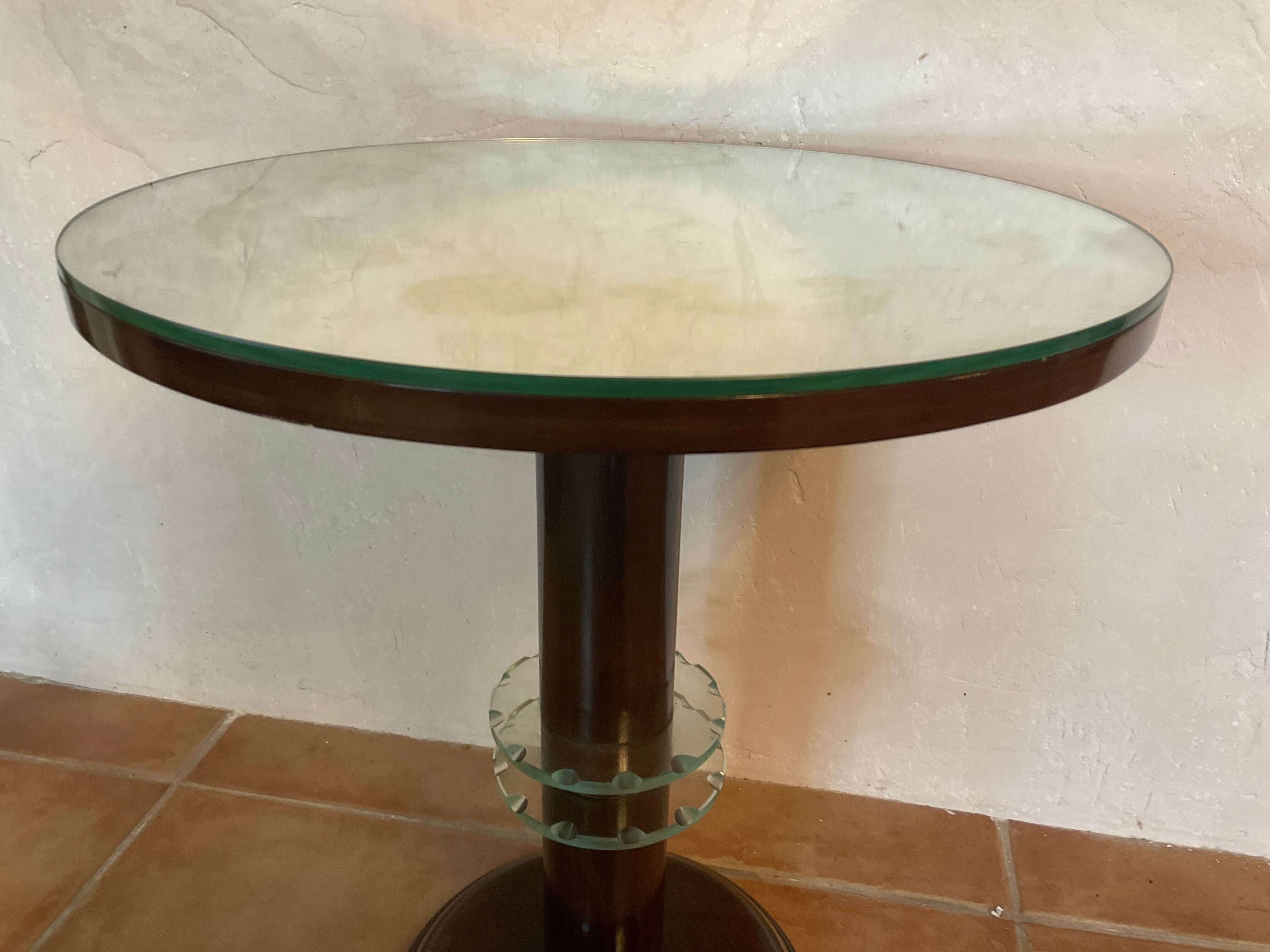 Vintage pedestal table design mirror glass and brass