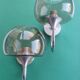 Pair of chrome metal and smoked glass wall lights from the 80s