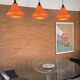Set of three orange opaline suspensions from the 1970s Space Age.
