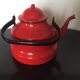 Red enamelled kettle