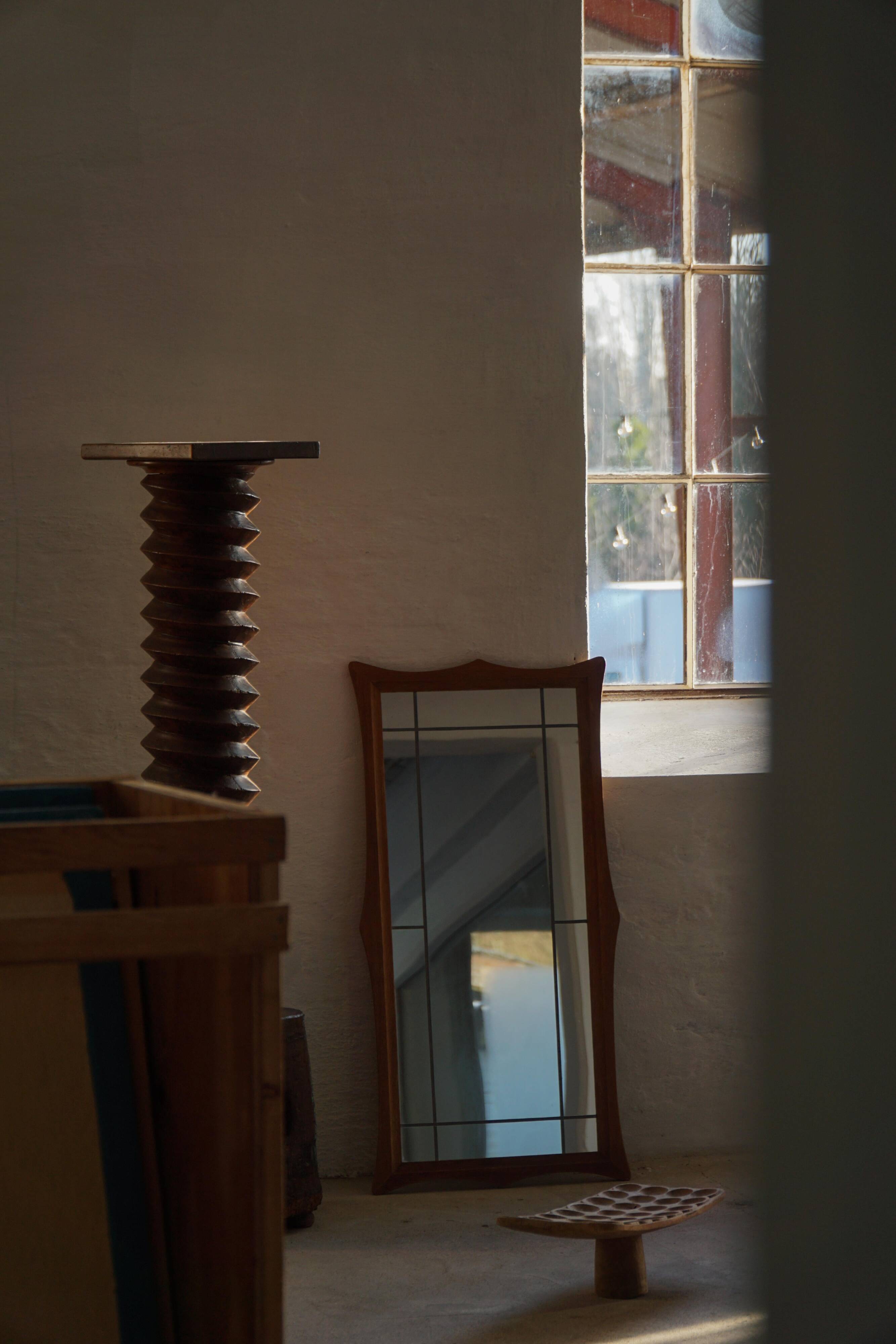 Danish wall mirror in solid oak from the mid-20th century, Scandinavian modern design.