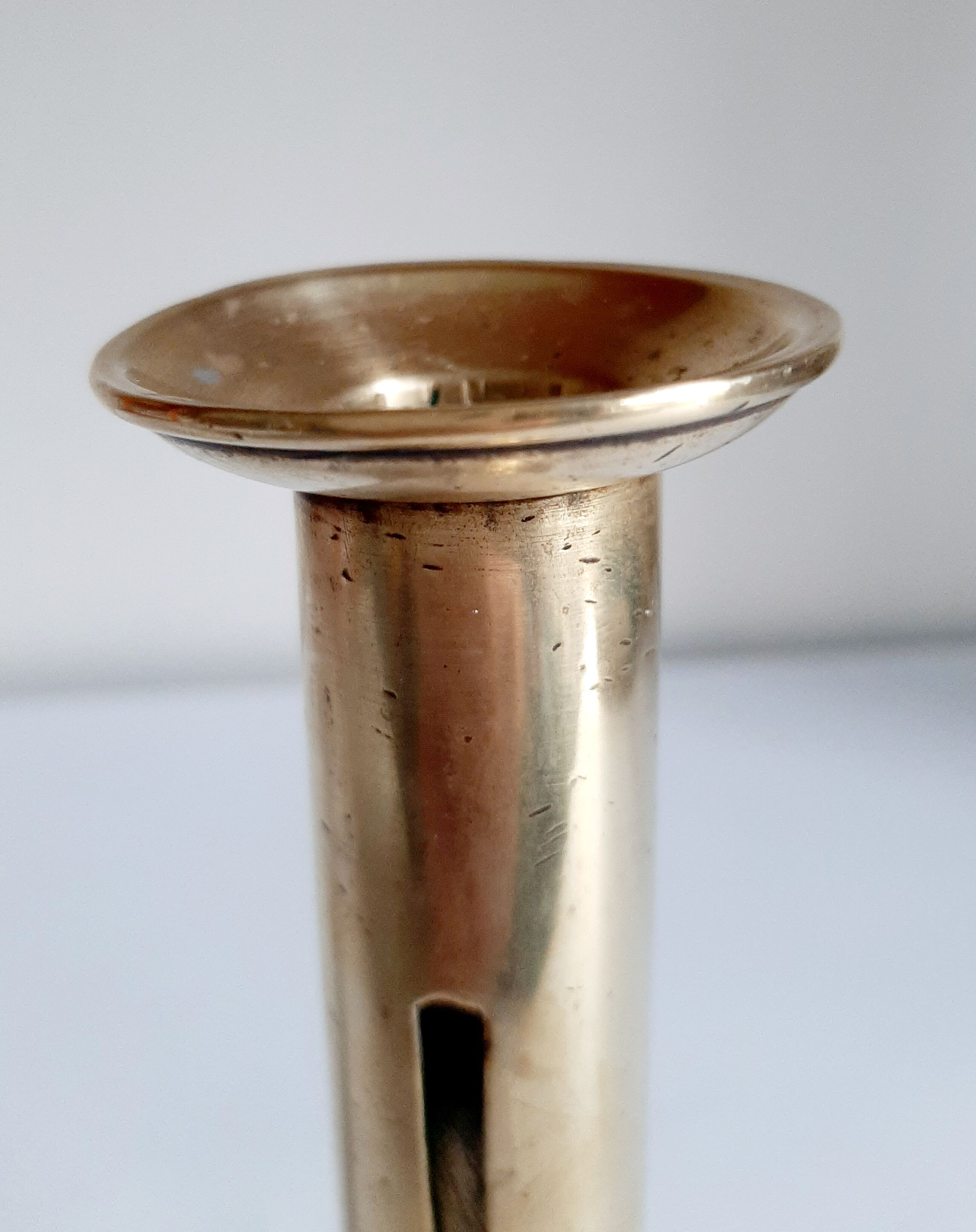 Golden brass candle holder