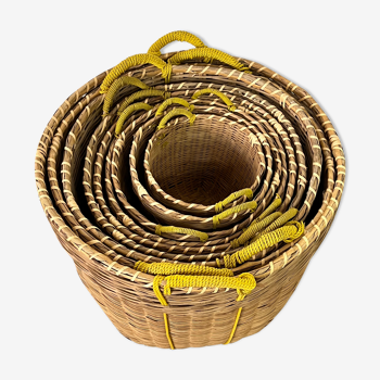 Set of 9 wicker trundle baskets