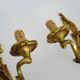 Antique pair of double-light bronze wall sconces with acanthus leaves. 1950s