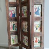 Wooden screen with vintage haute couture images or for photos