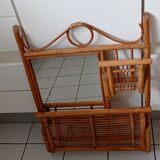 Old bamboo and rattan mirror with vintage folding shelves