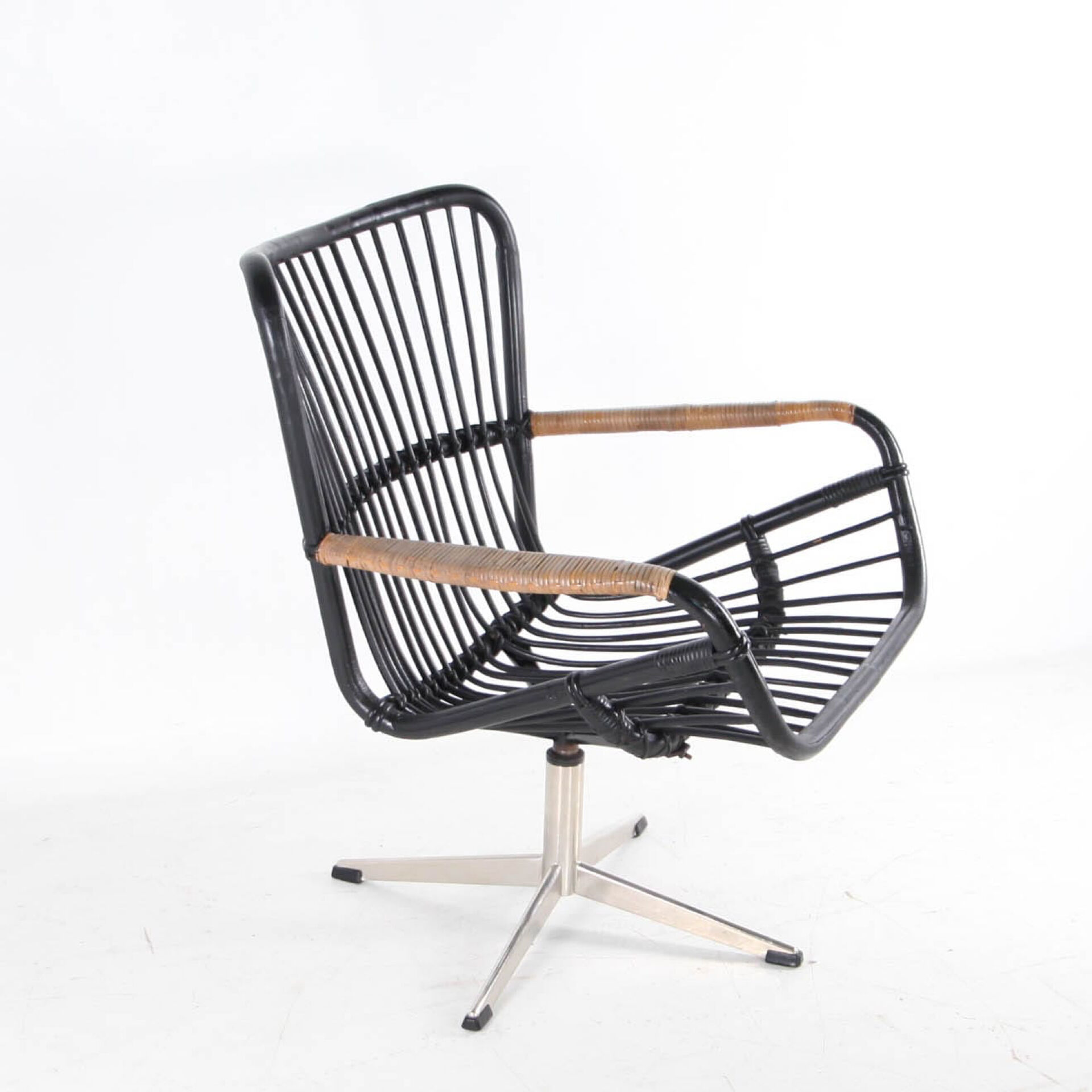 Rattan and chrome armchair
