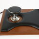 Two coat hangers, wood, leather and black leather, 70s