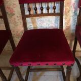Henri II style chairs covered with red velvet fabric