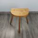 Raw wood tripod stool