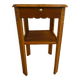 Small art deco style piece of furniture with one drawer and one shelf