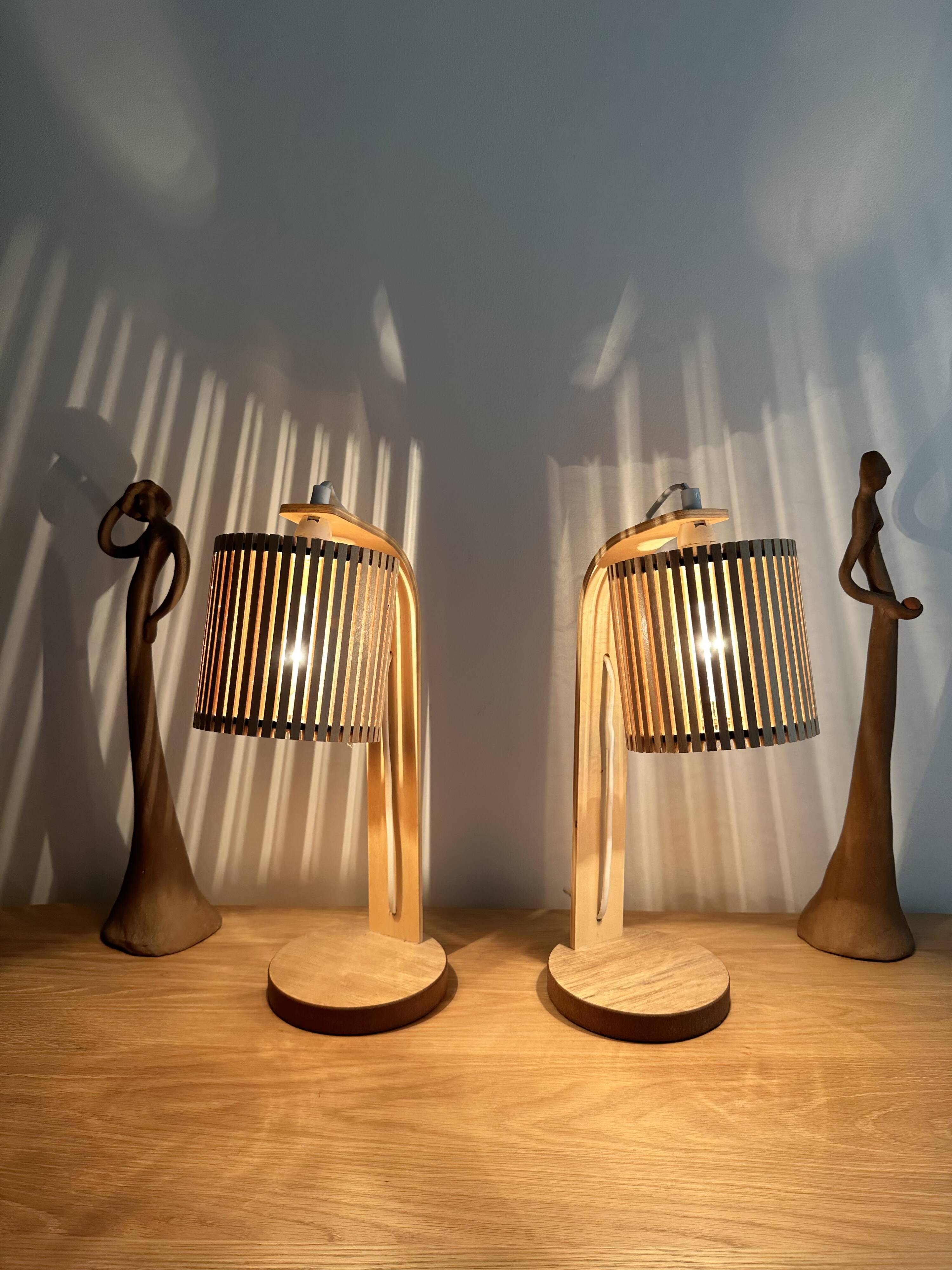 Pair of large Scandinavian lamps in natural wood.
