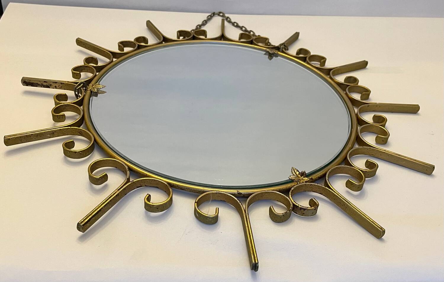Gold metal sun mirror