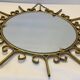 Gold metal sun mirror
