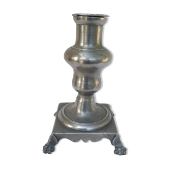 Pewter candlestick with lion paw feet