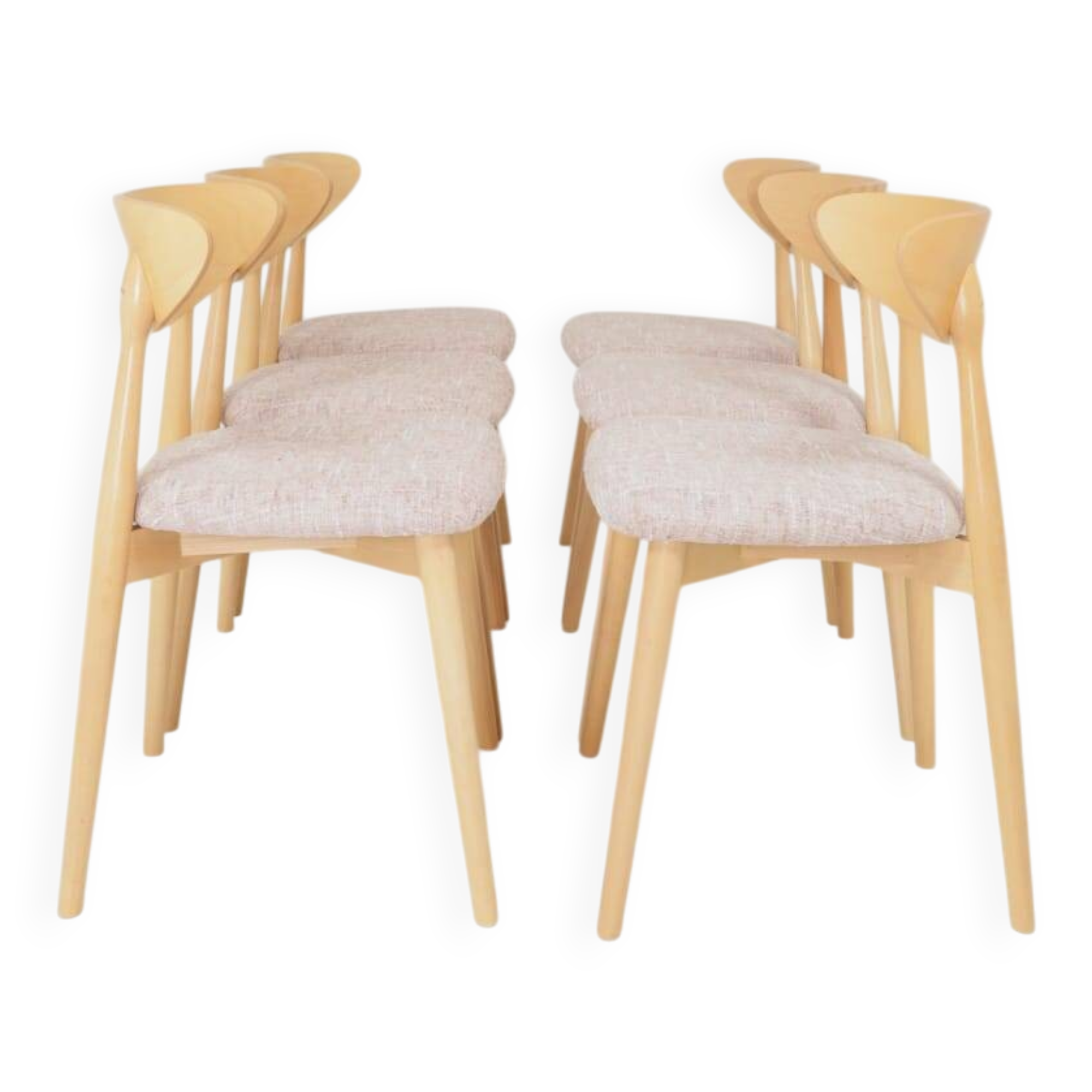 Set of 6 pale pink dining chairs in natural wood.