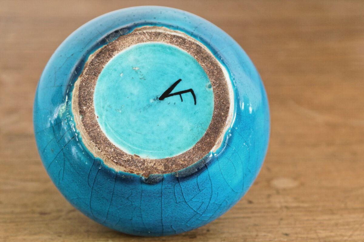 Glazed terracotta onion vase, signed