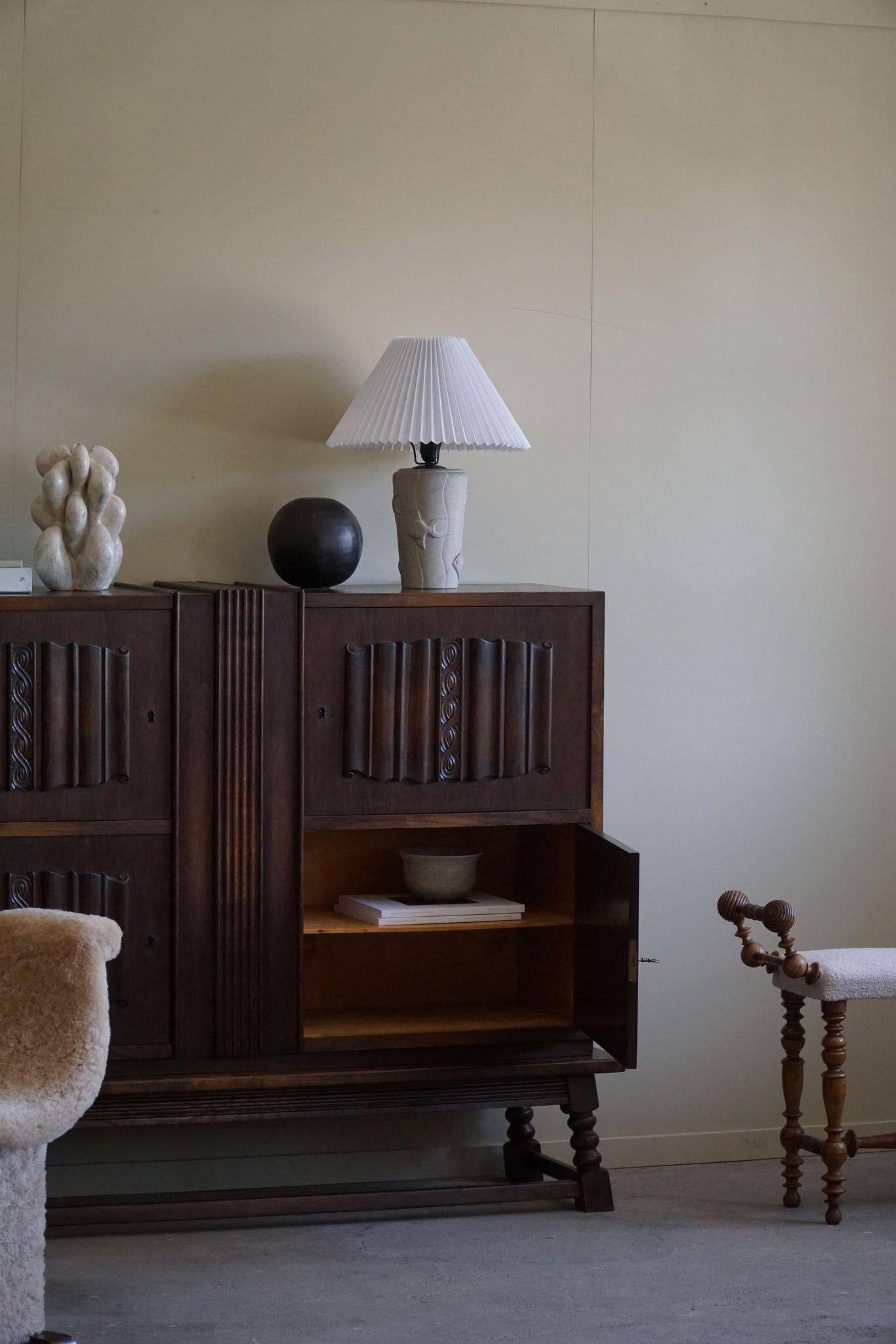 Modern vintage French table lamp, made of stone with fish patterns, 1970s.
