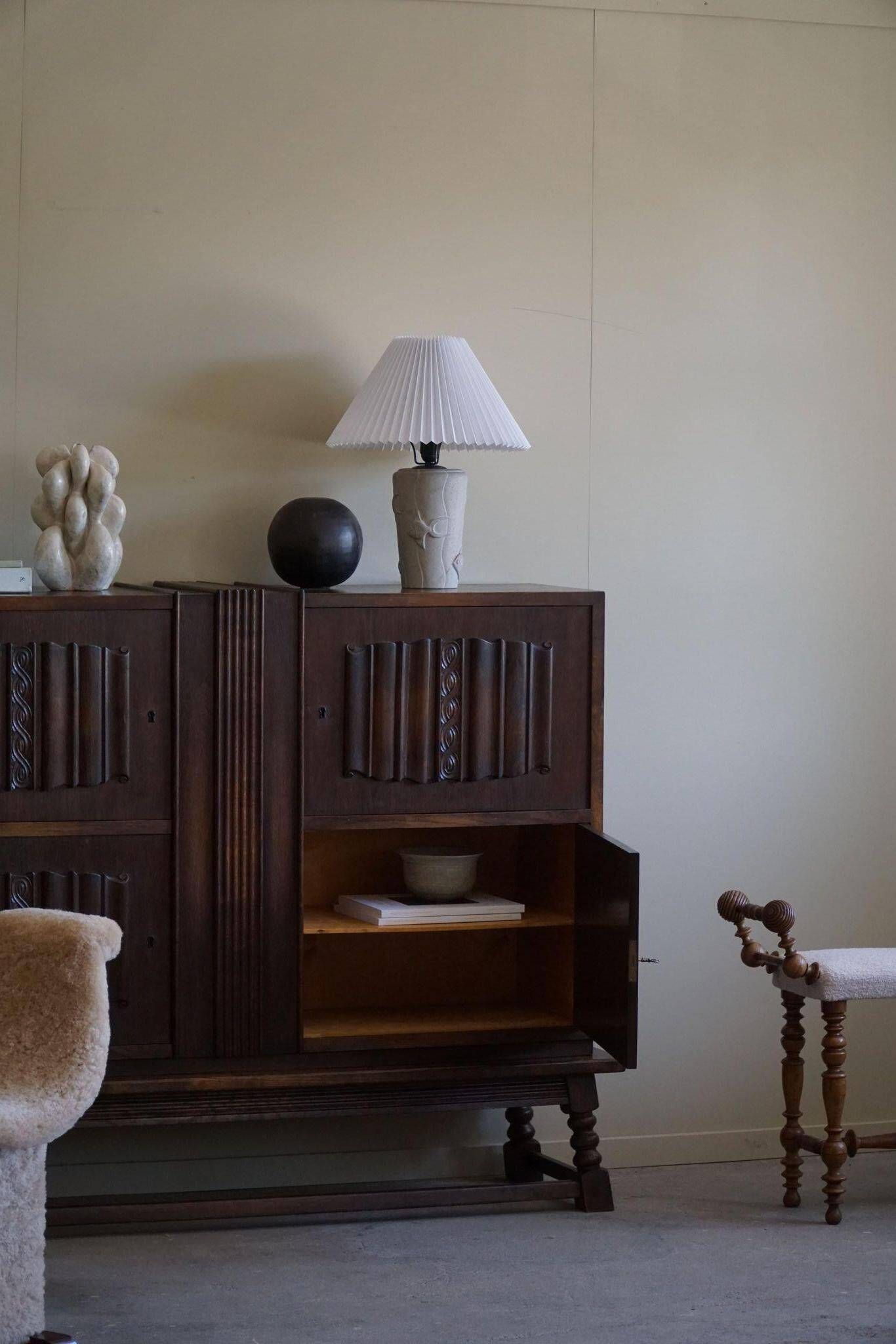 Modern vintage French table lamp, made of stone with fish patterns, 1970s.