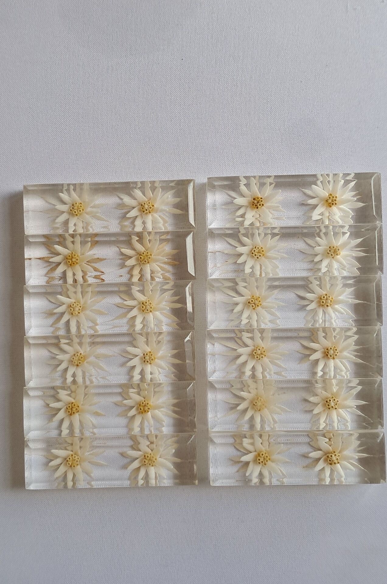 12 knife rests with resin inclusion. 1970s.