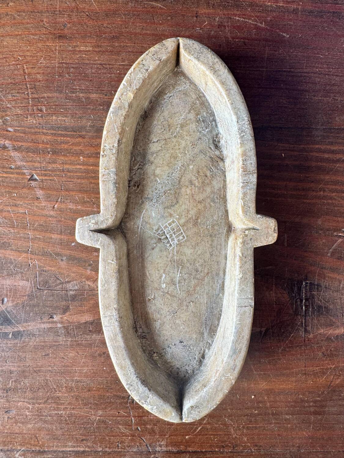 Small old carved stone cup, holy water font or soapstone