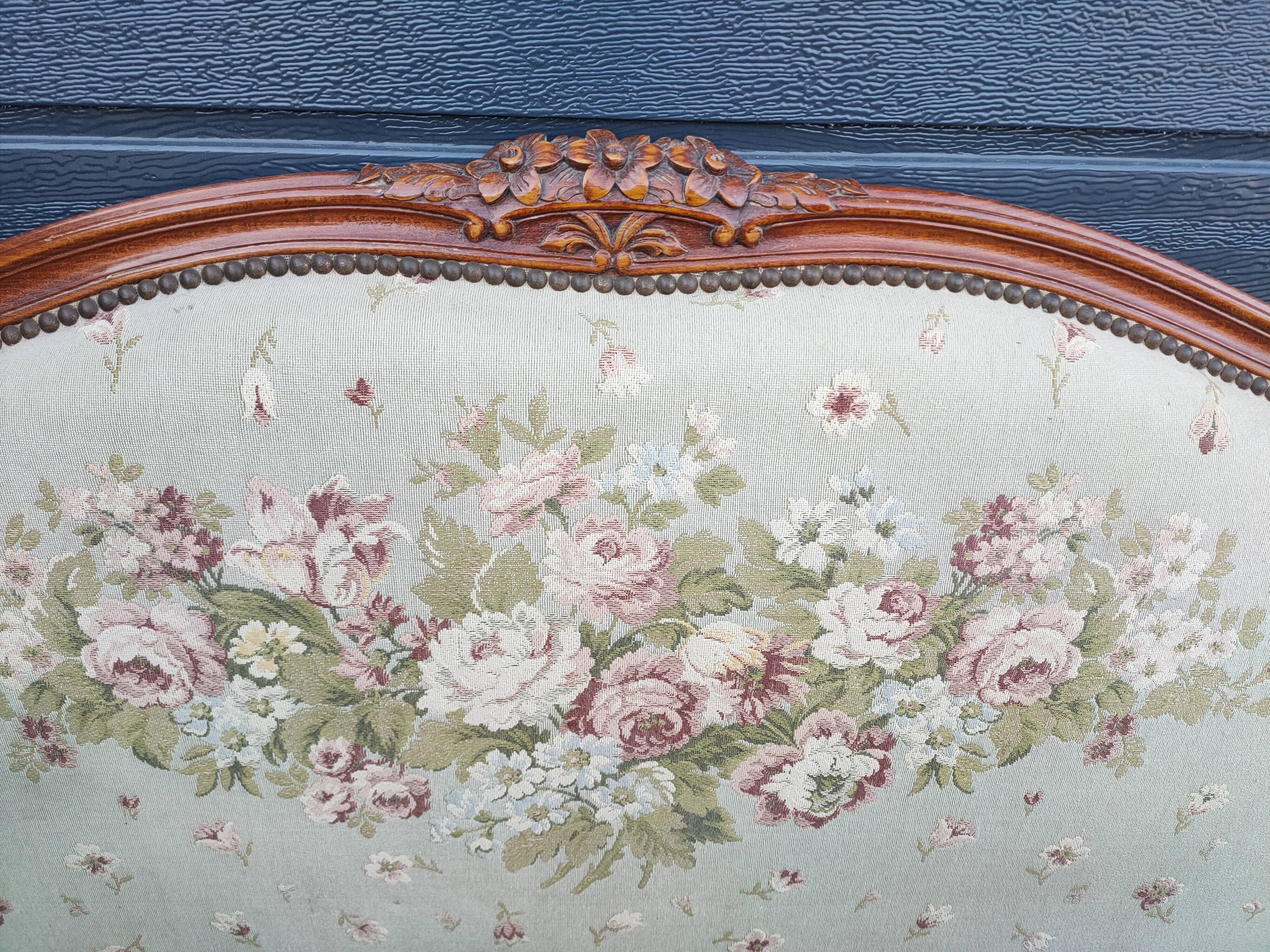 antique fabric and wood headboard