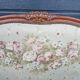 antique fabric and wood headboard