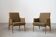 Pair of vintage armchairs in oak and embossed fabric, with old republished certificate of authenticity