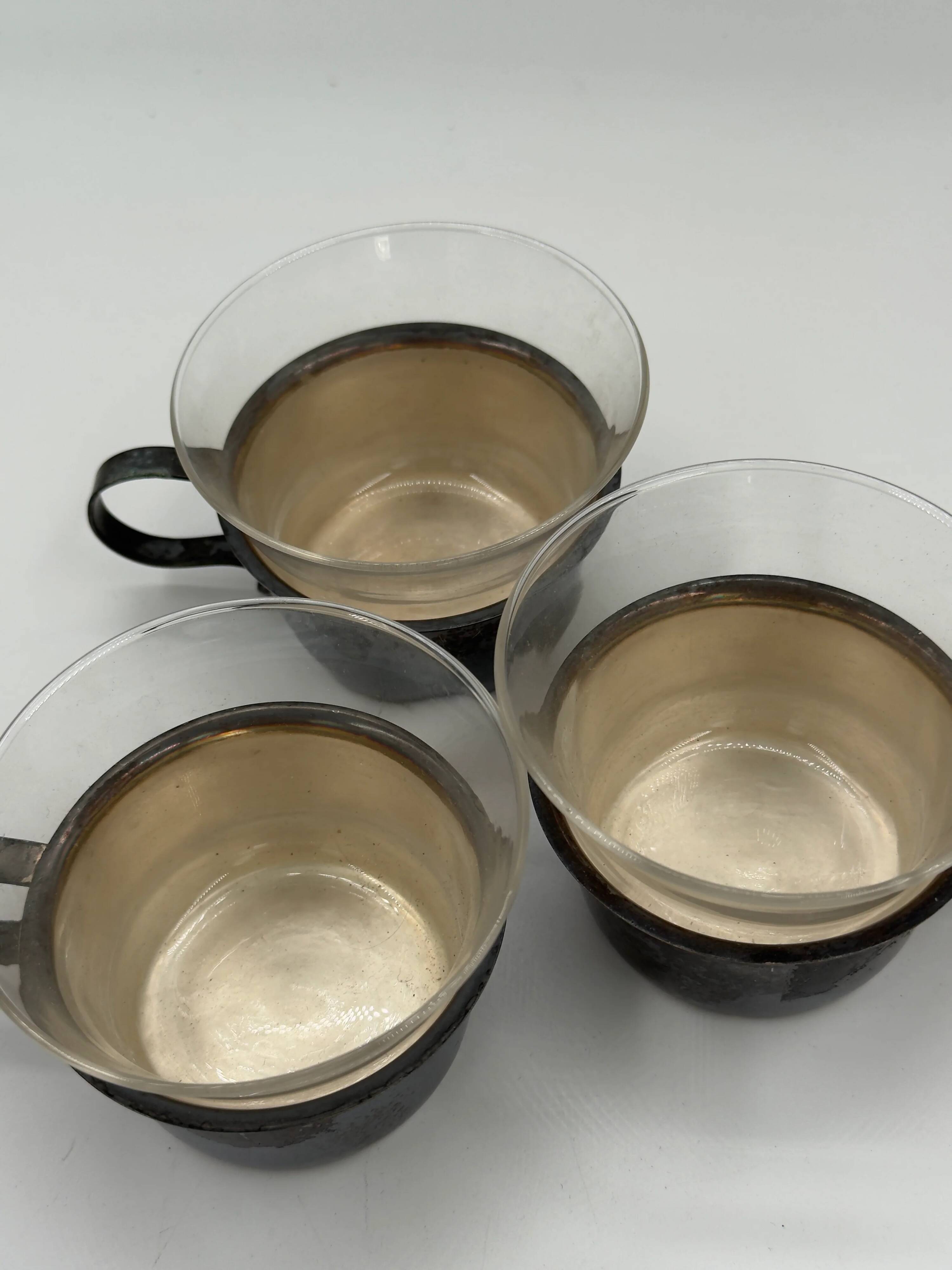 Set of 3 vintage tea glasses with silver-plated holders.