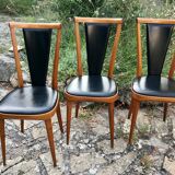 Four vintage beech and skai chairs