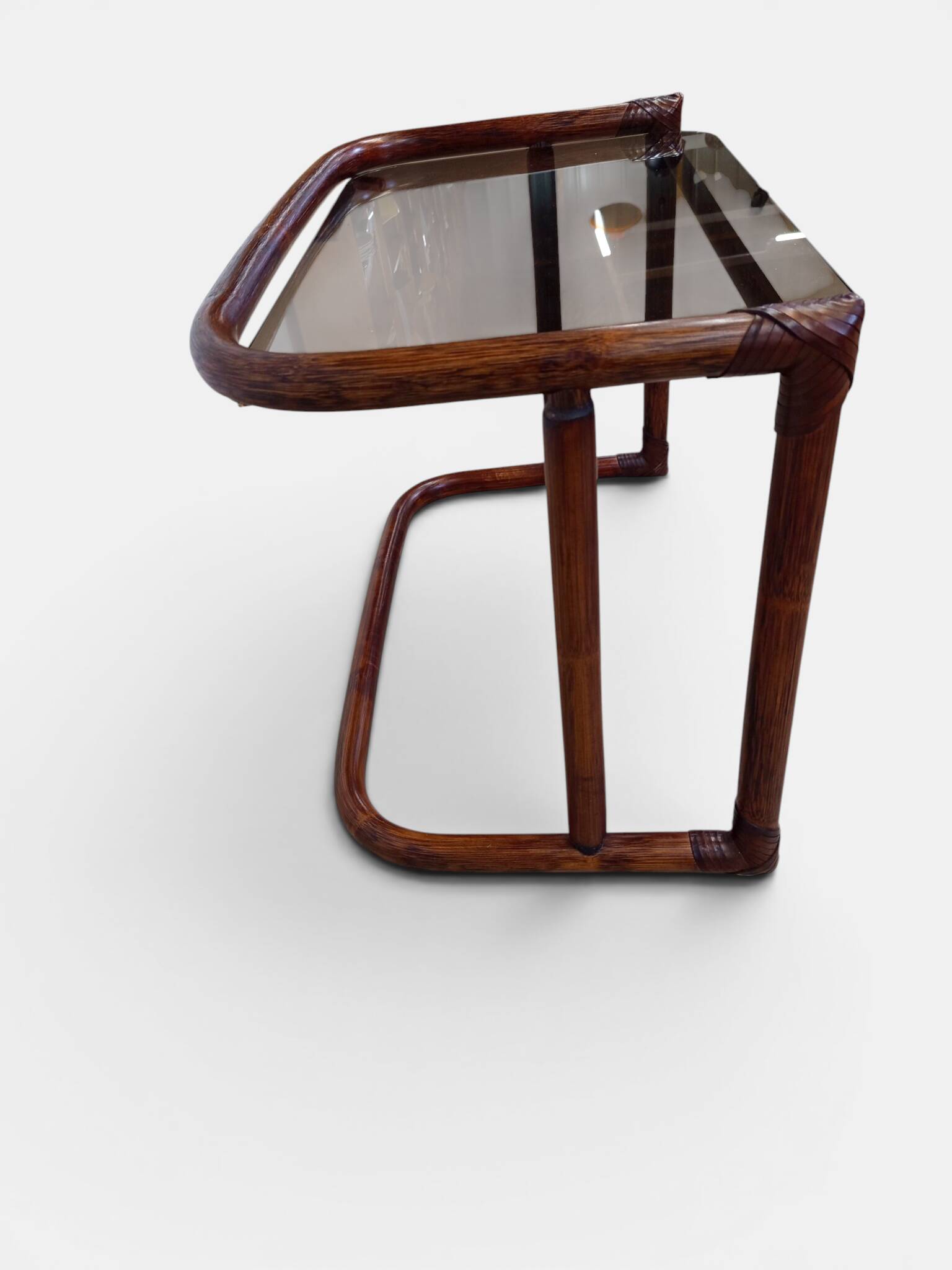 Vintage nesting tables in rattan and smoked glass by Flecht-Atelier Schütz.