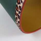 Vintage brass table lamp with green velvet shade.