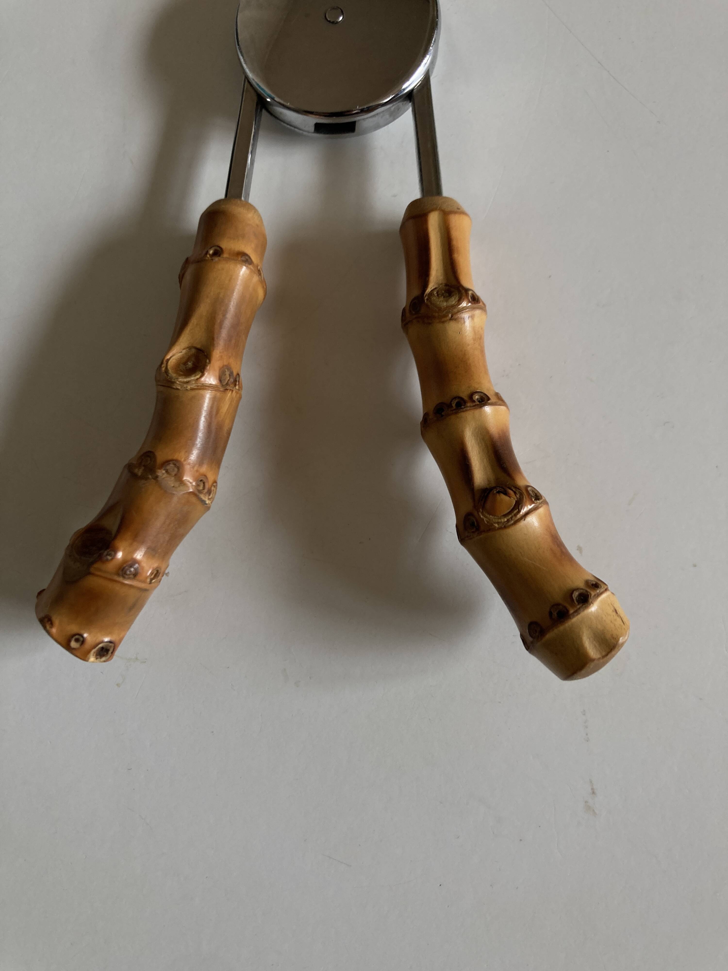1960 dlg Adnet steel and bamboo ice tongs