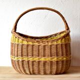 Vintage wicker basket crossed with a yellow scoubidou