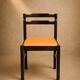 Set of 4 Mid-century beech / faux leather chairs.