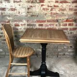 Bistro table in wood black foot and raw top