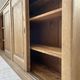 Large row of solid oak loom sliding doors