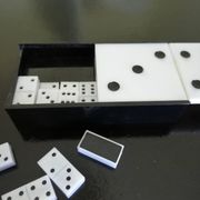Complete set of Miniature Dominos in a Black and White Box.
