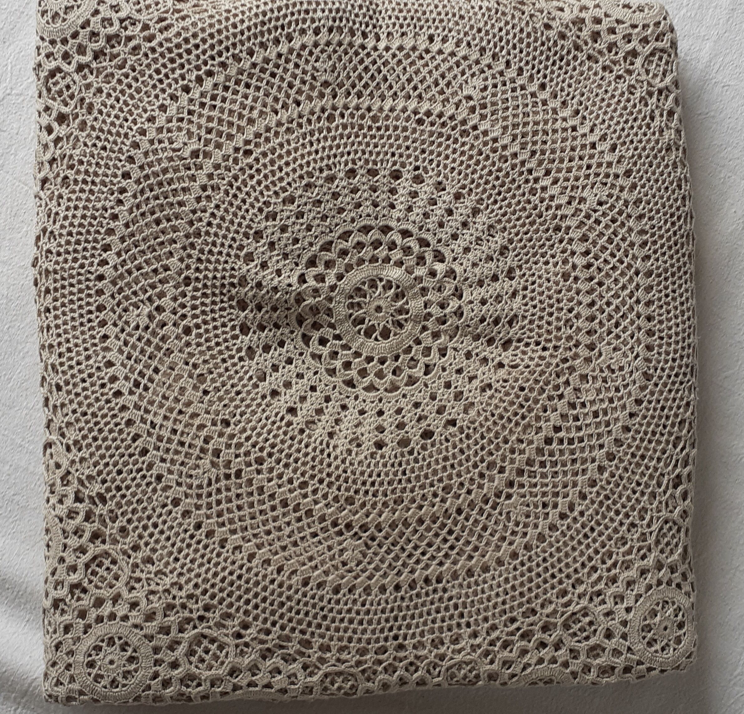 Old crochet round tablecloth with matching napkins