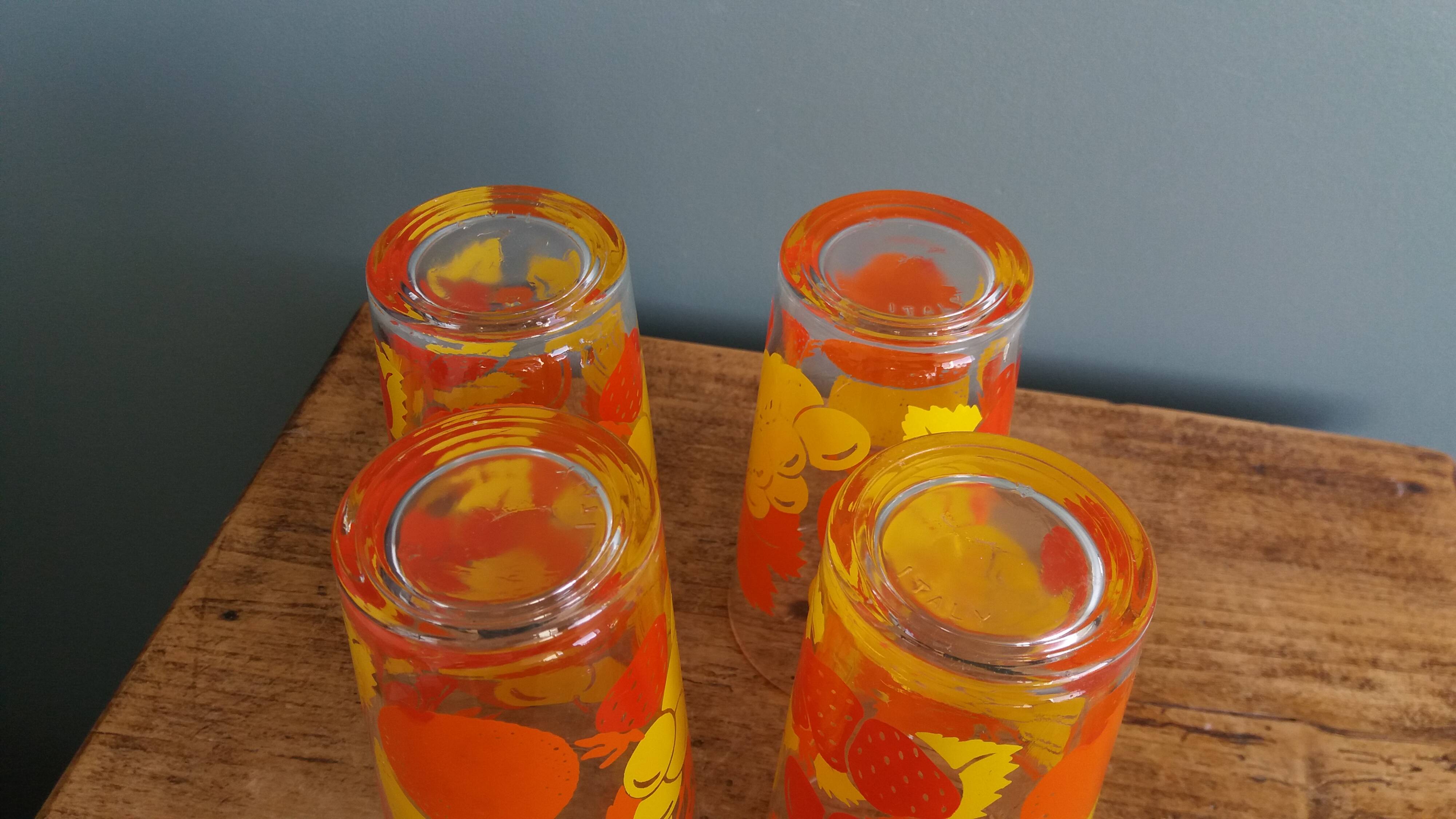Verres vintage décorated with orange and yellow lemon fruits, Italy.