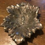 Bronze leaf pocket emptier