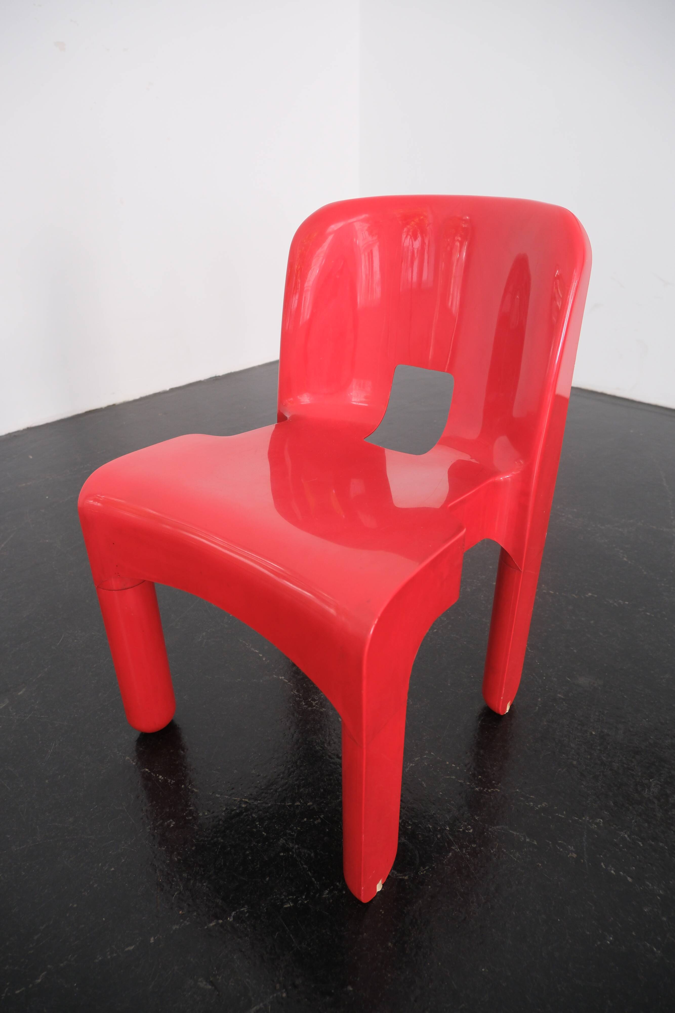 Red "Universale" chair by Joe Colombo / Kartell