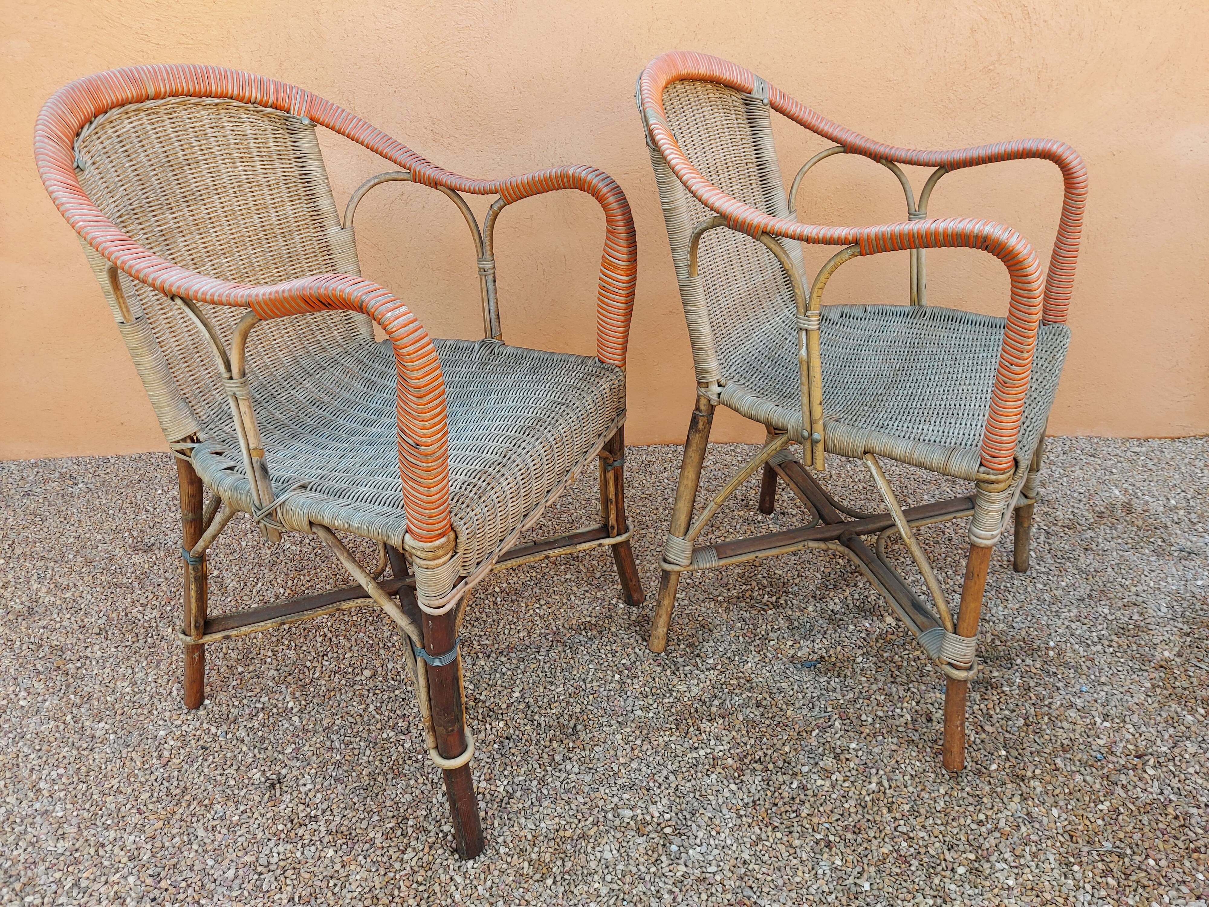 Pair of armchairs and rattan gueridon 1900s