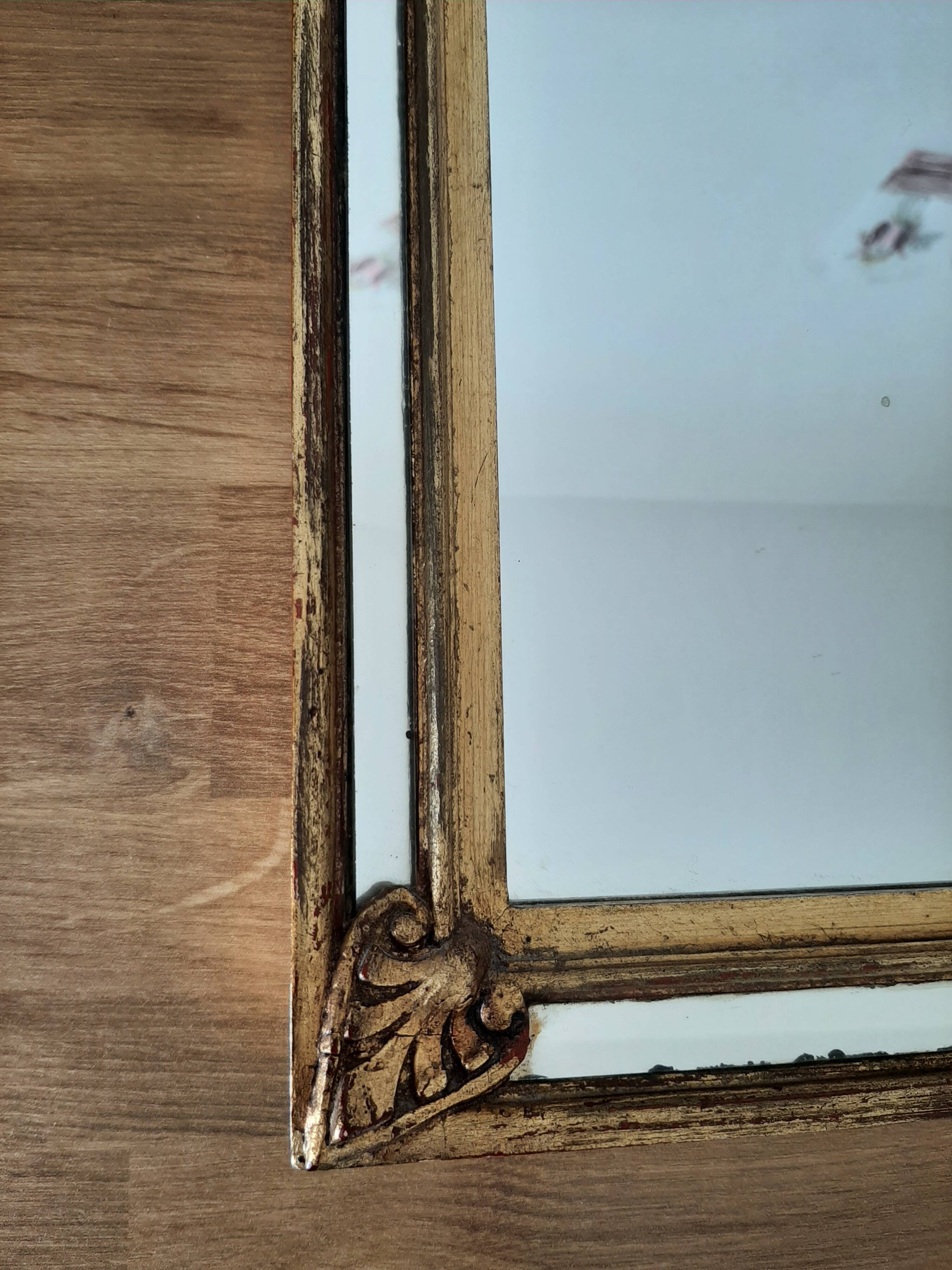 Gold-framed mirror