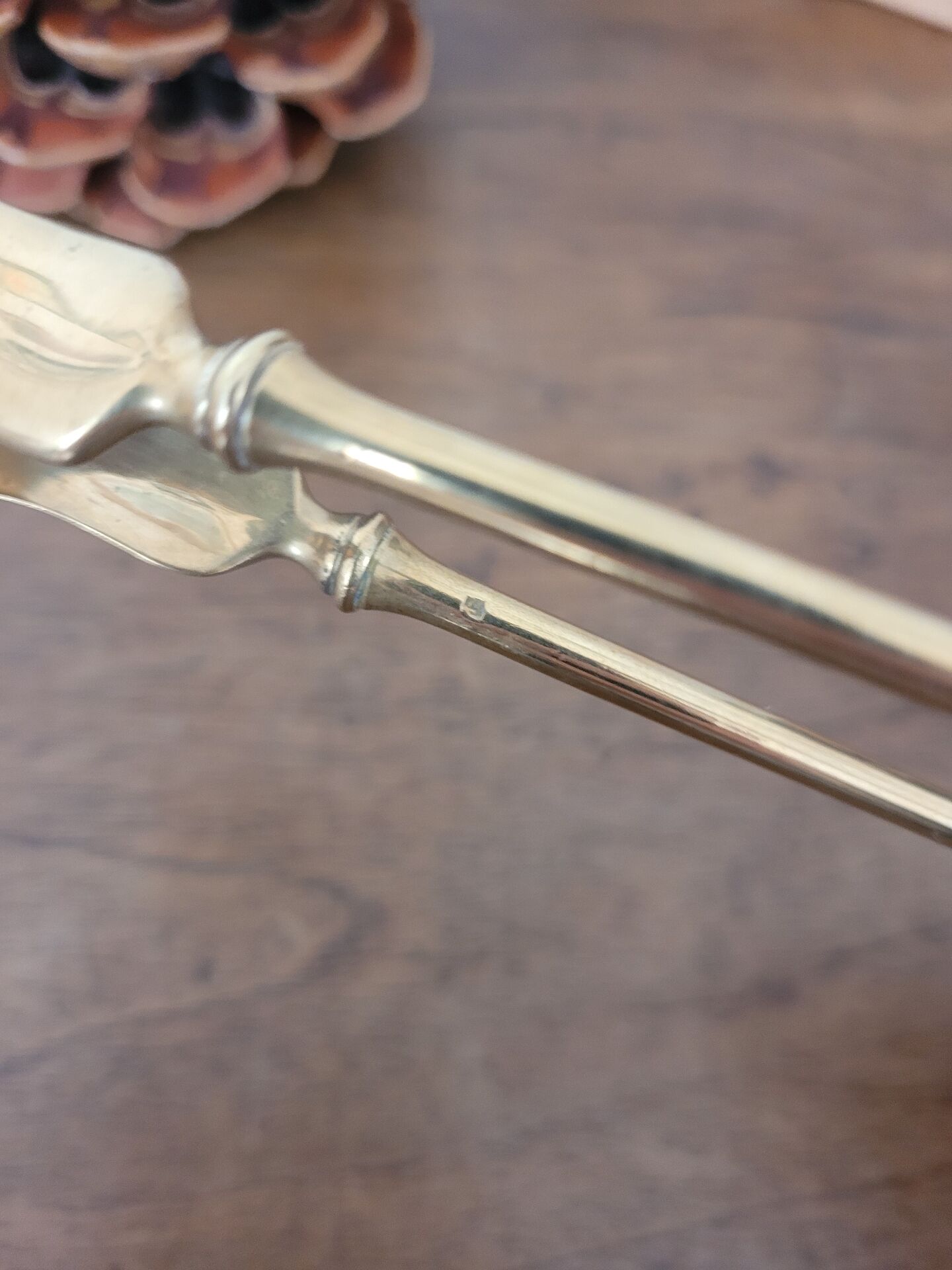 Golden metal sugar tongs