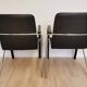 Set of 2 vintage office chairs in black leather chrome base plastic armrests / retro 1980s room