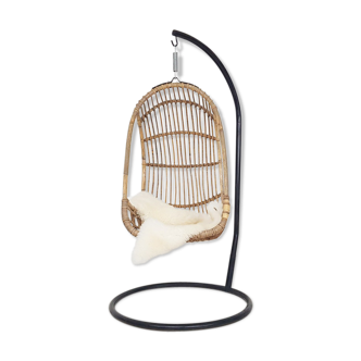 Vintage egg shaped bamboo hanging chair on metal base