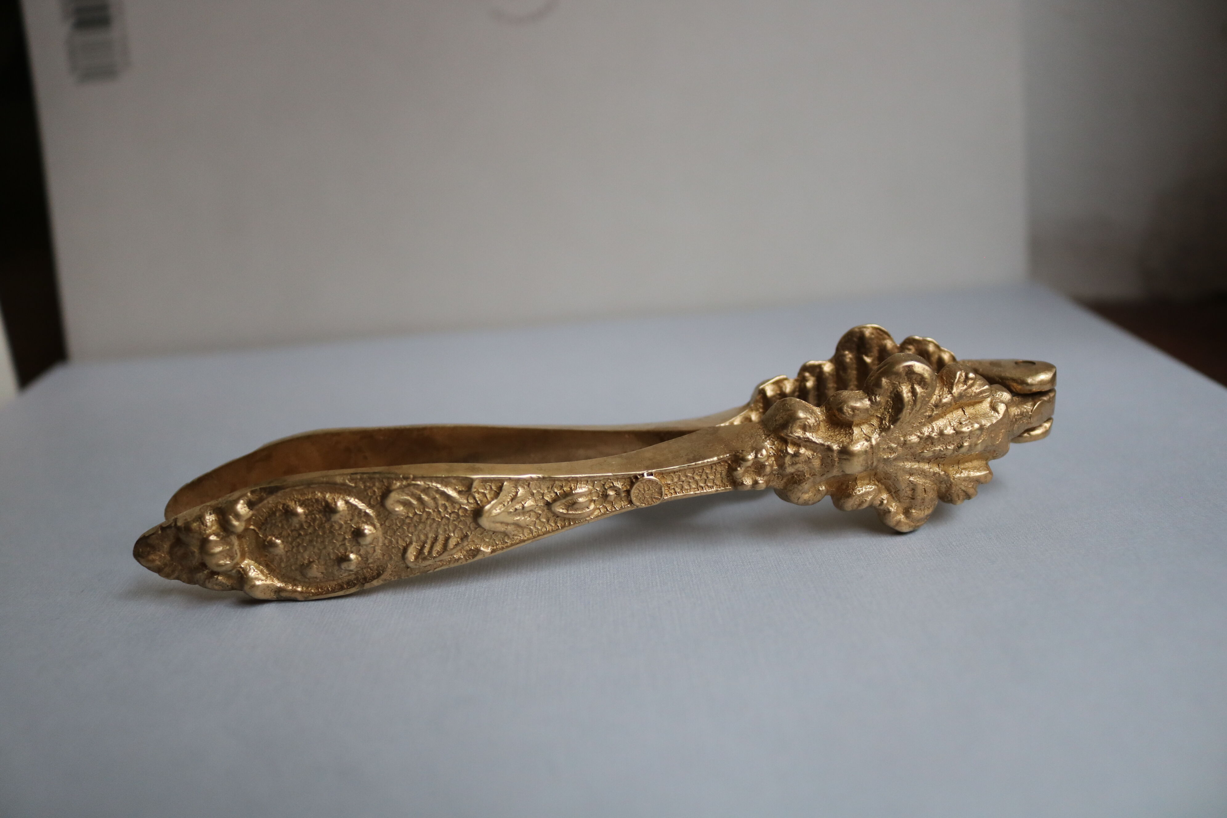 Vintage brass ornate nutcracker