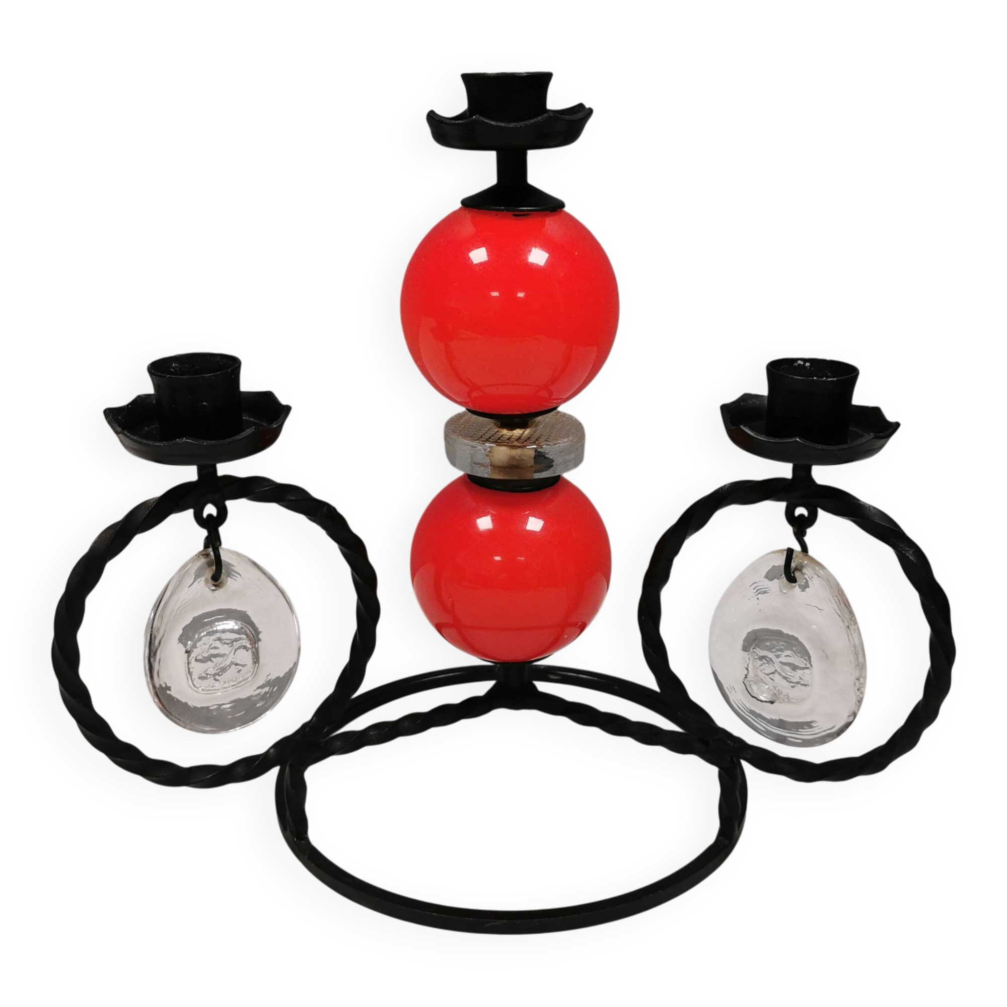 Wrought iron candle holder for 4 candles. by Erik Höglund in the 1960s