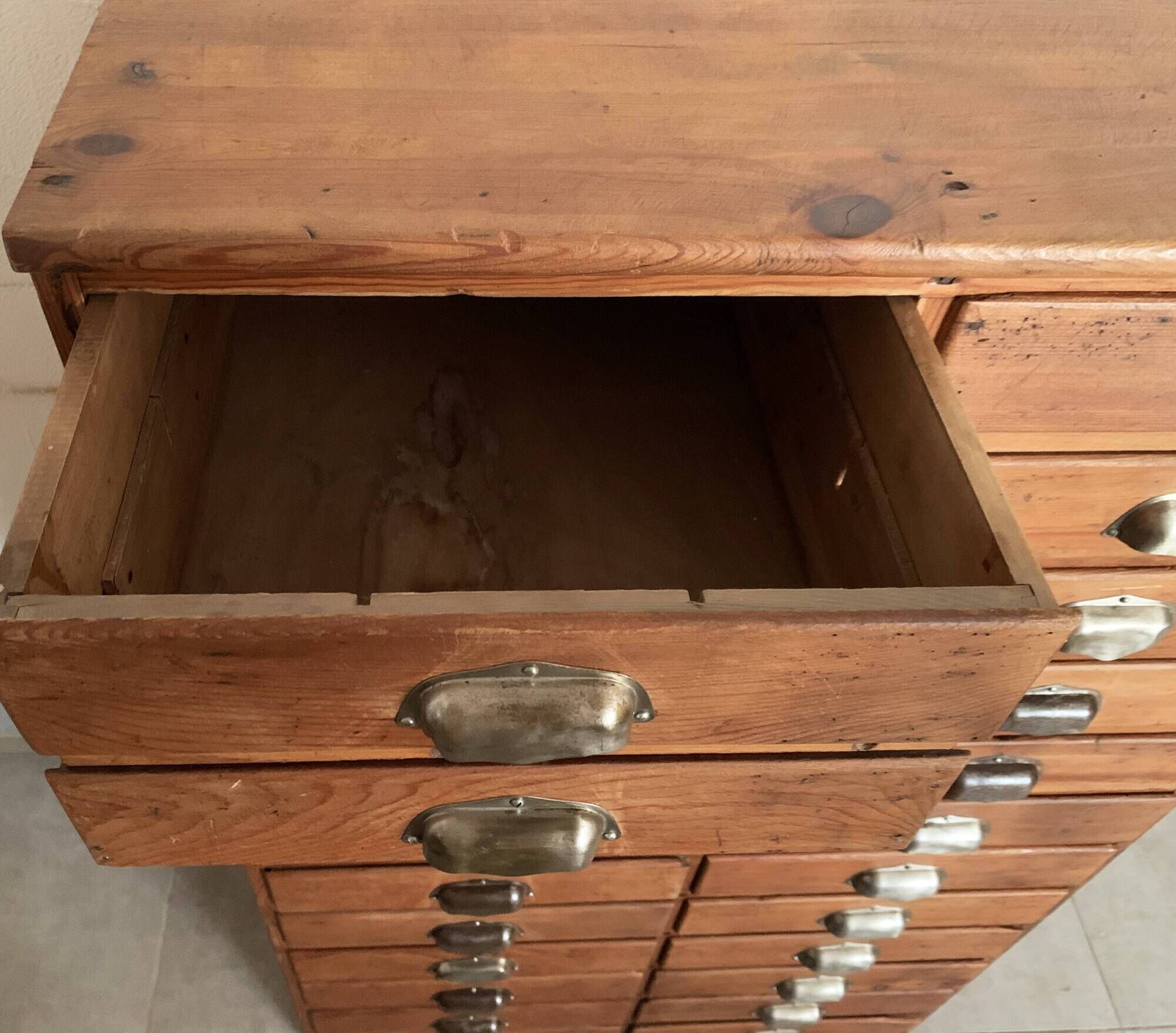 Old apothecary trade furniture in vintage wood 24 drawers.